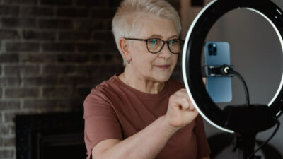 Senior woman enjoying daily activities after she get a free iphone from a verified 2026 offer