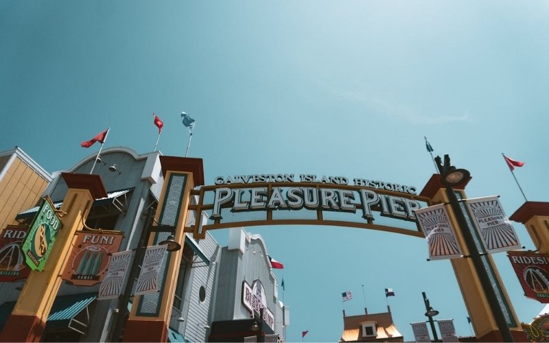 Entrance sign at Galveston Island Historic Pleasure Pier showcasing iconic things to do in galveston texas