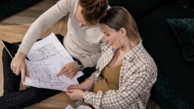 Couple reviewing home plans and financing options for best home improvement loans in Texas