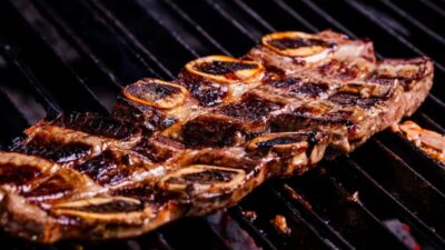 how to cook ribs on the grill with smoky charred surface and tender meat
