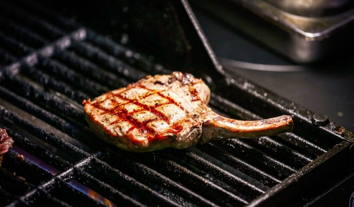 Grilled pork chops prepared with timing guidance for how long to cook pork chops on the grill