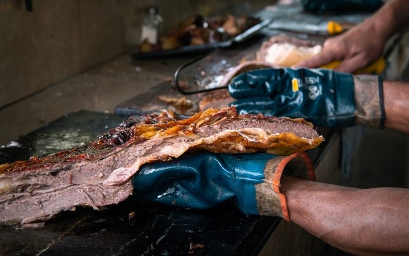 How to smoke a beef brisket on a pellet grill starts with trimming fat and seasoning evenly