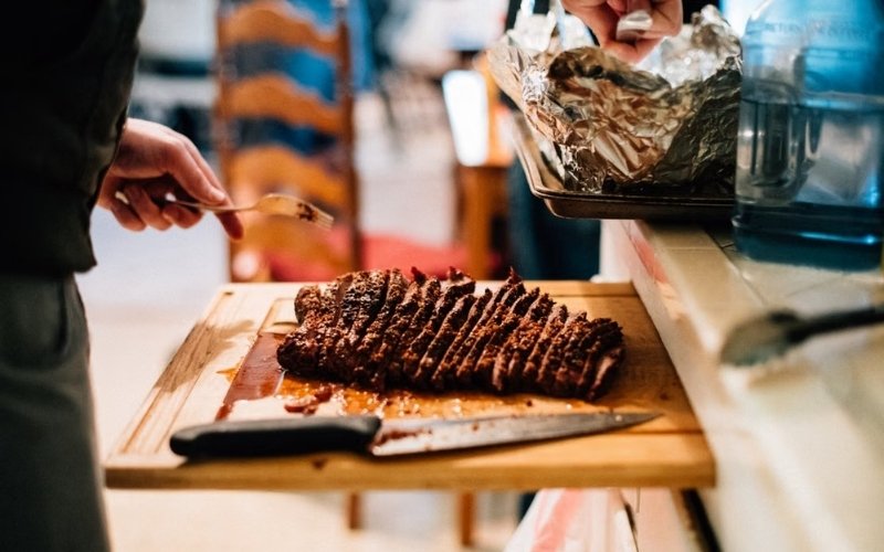 How to smoke a brisket on a pellet grill by wrapping brisket to retain moisture